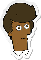 sticker of a cartoon staring face