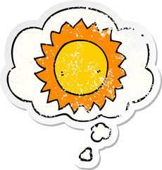 cartoon sun and thought bubble as a distressed worn sticker