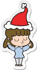 sticker cartoon of a indifferent woman wearing santa hat