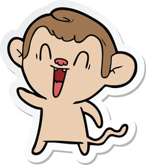 sticker of a cartoon laughing monkey