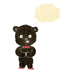 cartoon teddy black bear with thought bubble