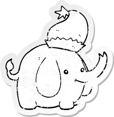 distressed sticker of a cute cartoon christmas elephant