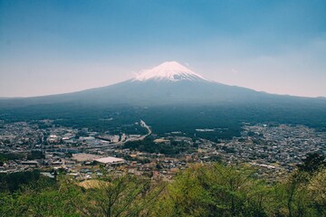 Mount Fuji surrounded by houses
