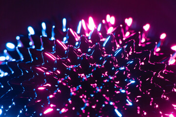 Closeup shiny ferrofluid spikes