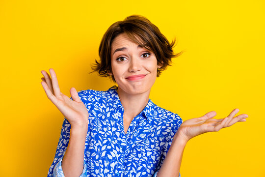 Photo of pretty cute lovely lady wear blue clothes showing two hands gesture no answer isolated on yellow color background