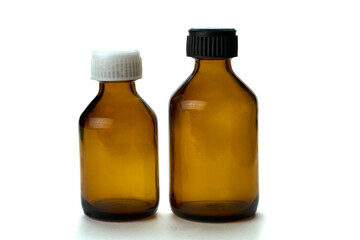 Medical medicine bottle with black cap isolated on white background.