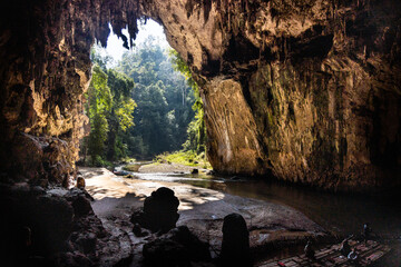 The scenic chamber with river in the Tham Nam Lod cave, popular tourist attraction in Mae Hong Son, Thailand - obrazy, fototapety, plakaty
