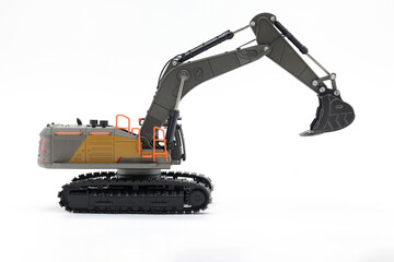 Backhoe hydraulic Excavator with bucket. side view. Wide angle. Isolated on white background.	