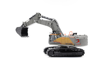 Backhoe hydraulic Excavator with bucket. side view. Wide angle. Isolated on white background.	