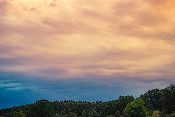 Morning landscape on an overcast day at the fields. Cloudy weather background concept. Fresh nature backdrop with copy space