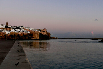 Sunrise over the Bouregreg River overlooking the modern buildings of Rabat, among which the futuristic Mohammed VI tower stands out