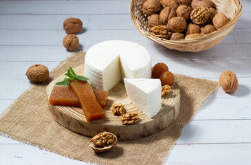 Typical Spanish appetizer. Fresh cheese, quince jelly and walnuts.