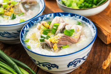 Chinese cuisine: a bowl of delicious fish porridge