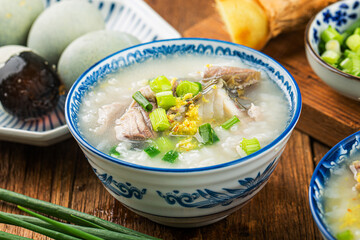 Chinese cuisine: a bowl of delicious fish porridge