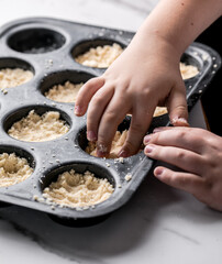 Kid chef cook at kitchen. Child prepares food . Kids cooking.