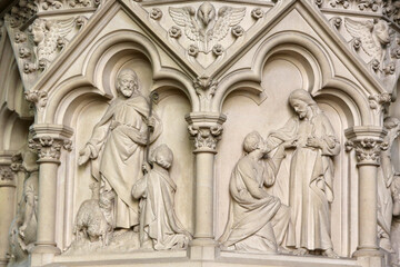Fototapeta na wymiar St Martin's catholic church, Villers sur Mer, France. Reliefs.