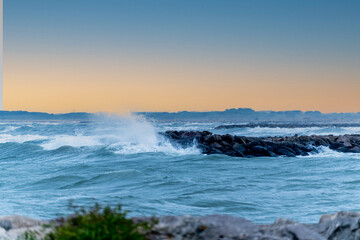 waves crashing in sunset
