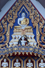 Relief carvings in a Hua Hin temple. Thailand.