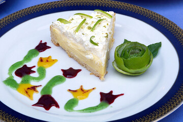 Lemon pie, slice of lemon cake decorated with flavored jams and lemon peel, dessert and food