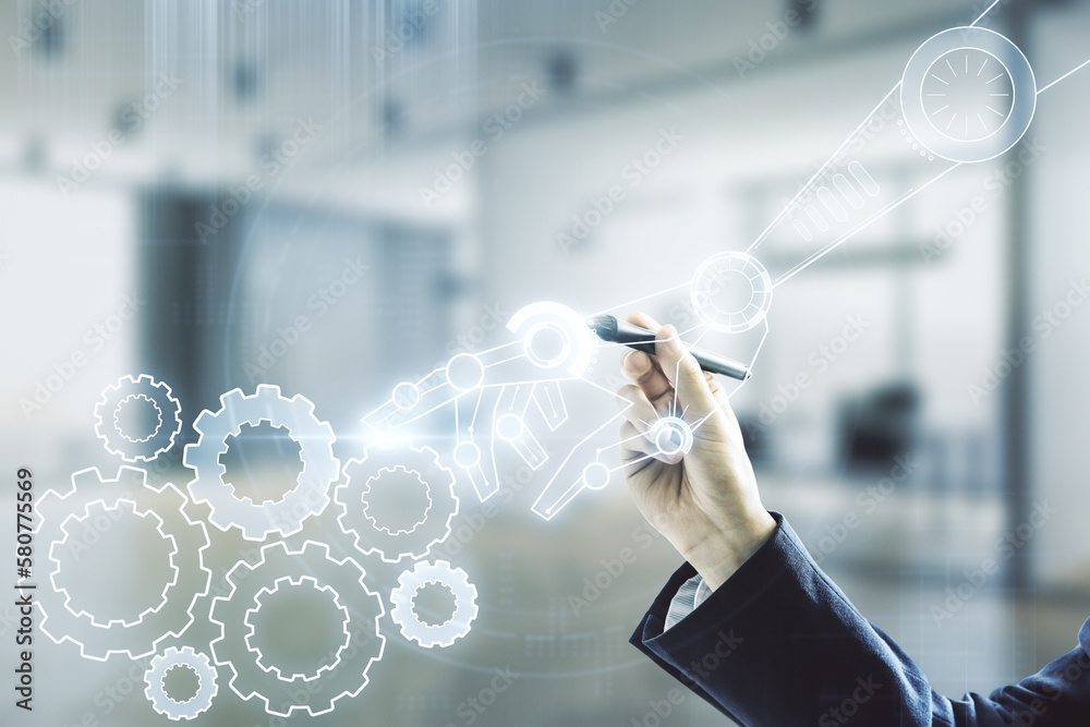 Aufkleber man hand with pen draws abstract virtual robotics technology hologram on blurred office background. 