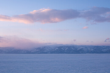 Beautiful sunset on Lake Baikal in winter.