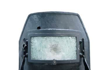 Demonstration of protective shields to protect police and special forces with bullet damage in bulletproof glass, isolated on a white background