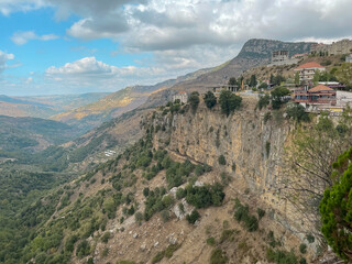 Fototapeta na wymiar Timelapse of mountain top and nature view - Aerial view of Jezzine town in Lebanon, on an altitude of 1000m, surrounded by mountain peaks and pine forests - South Lebanon