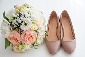 wedding pumpkins with a delicate bouquet on a white background