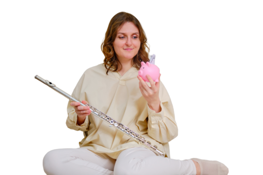 Woman musician with piggy bank at home on sofa in living room, isolated on a white background