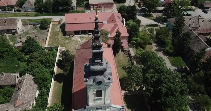 
Flying over Ortodox Church.
Flight of the camera over the Orthodox Church.
Rural ortodox Church and countryside.
Aerial: Flying over forest and church
Aerial view of Ortodox church in countryside.

