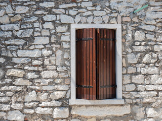 Fototapeta na wymiar old window in an italian house