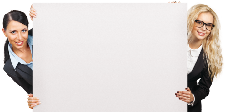 Two businesswomen holding blank sign board isolated on white