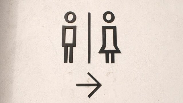 Toilet pointer, silhouette of a man and a woman