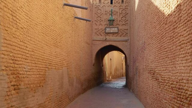 Medina of Tozeur the old city pathway trough the arch. Travelling to North Africa to the brick city. Place of historic interest.