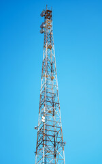 cell tower against the blue sky
