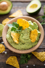 Homemade guacamole dip in the bowl
