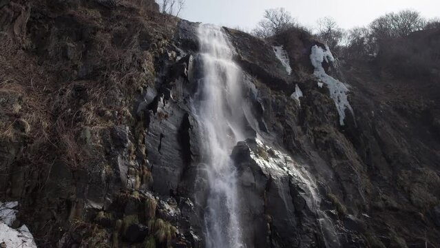 hokkaido waterfall, japanese waterfall, winter waterfall, falling water, handheld shot