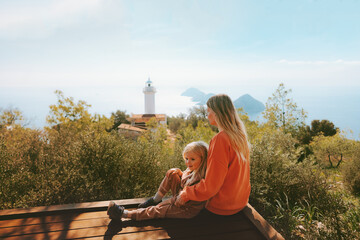 Mother and child traveling in Turkiye outdoor family summer vacations lifestyle hiking Lycian way Gelidonya lighthouse landscape - obrazy, fototapety, plakaty