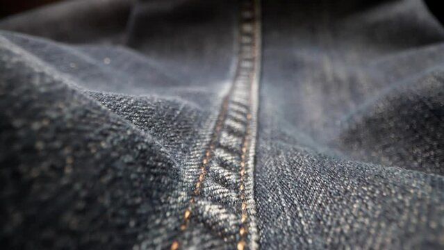 Denim denim texture close-up, lens test along texture seams