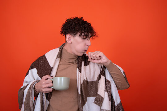 Illness and health problems. A young guy and a cold.