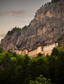Historical Sumela Monastery at sunset. It is a Greek Orthodox monastery and church complex. Historical and touristic places of Turkey. Macka district, Trabzon