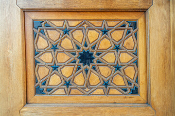 Islamic design carved into wood panel.Islamic woodwork design.