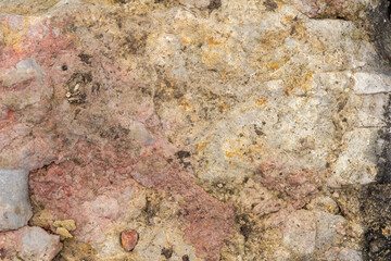 walls in a mountain cave, natural stone, cut structure, material for construction work and design solutions.