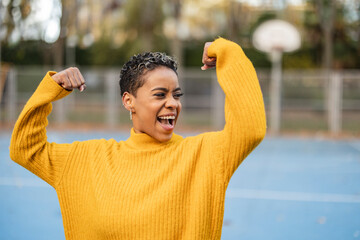 empowered woman, portrait of pretty african american woman with short hair