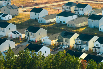 Aerial view of tightly packed homes in South Carolina residential area. New family houses as example of real estate development in american suburbs