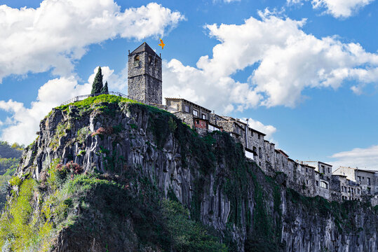 Views of the town of Castellfollit de la Roca, settled on a basaltic cliff in the region of La Garrotxa, Girona, Catalonia	