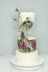 Large wedding cake with rice paper decorations