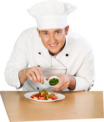 Chef garnishing a dish