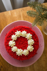 Fototapeta na wymiar Cake Red Velvet. Appetizing biscuit cakes and white cream.