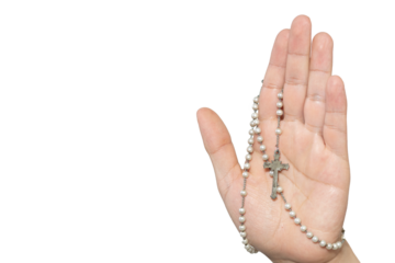 Palm of a white hand holding a rosary on a white background